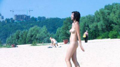 Hot nudist teen filmed by voyeur as she sits naked outside - hclips
